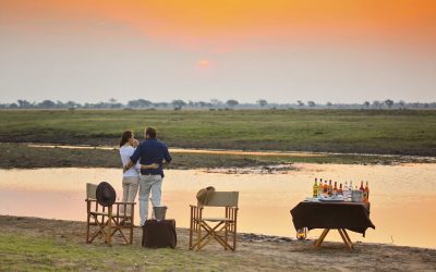 Botswana_Chobe_Ngoma-Safari-Lodge_Sonnenuntergang-Drinks_BoutiqueReisen